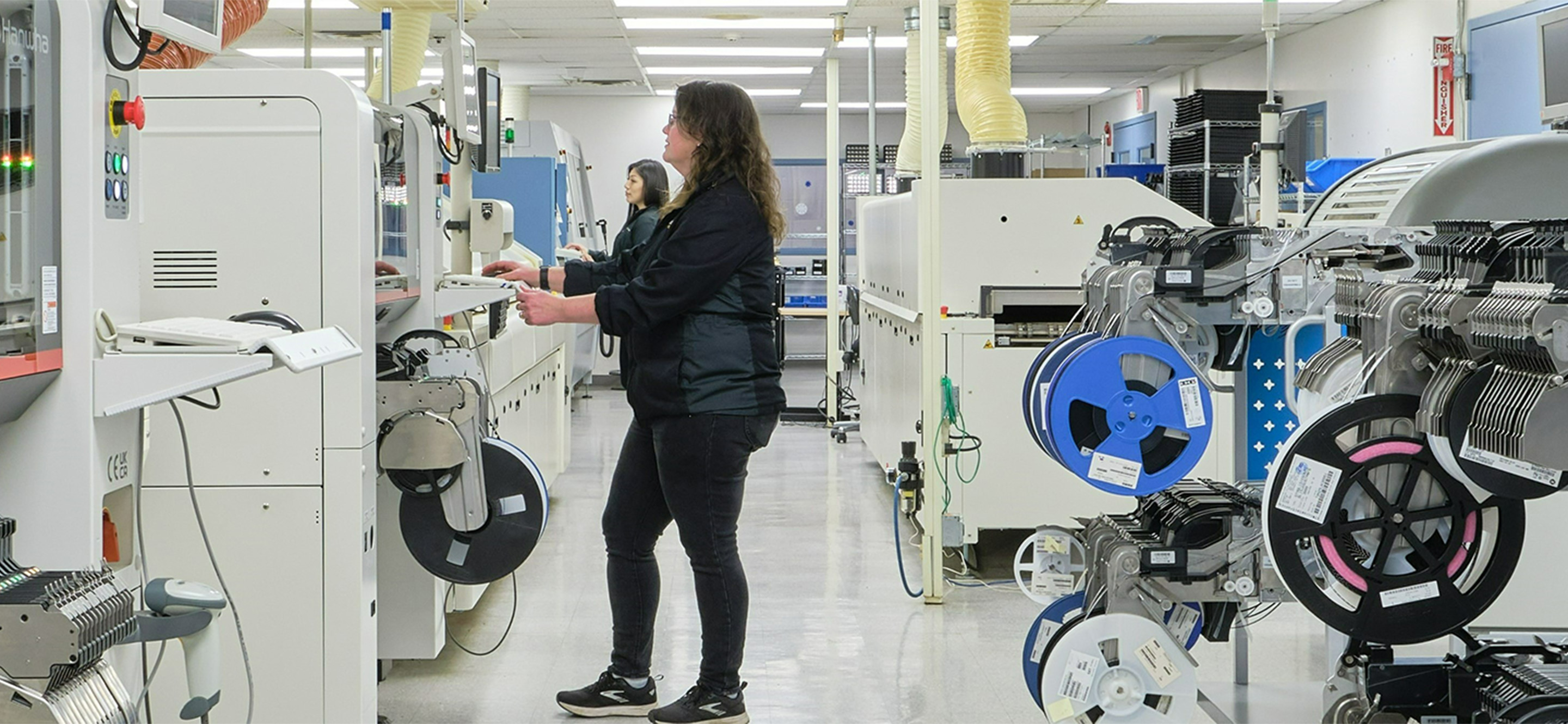 Woman working at machine