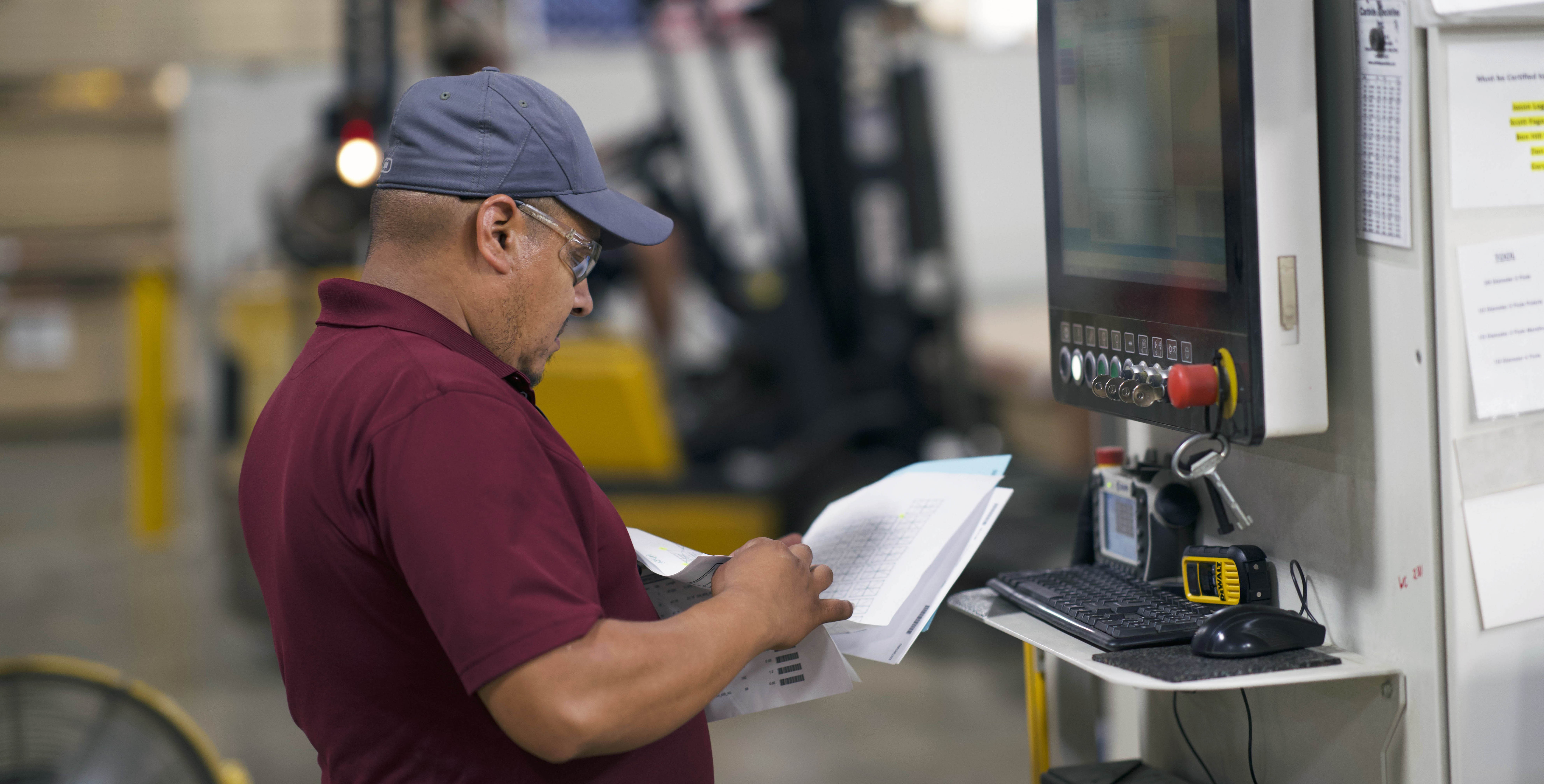 Man looking at papers